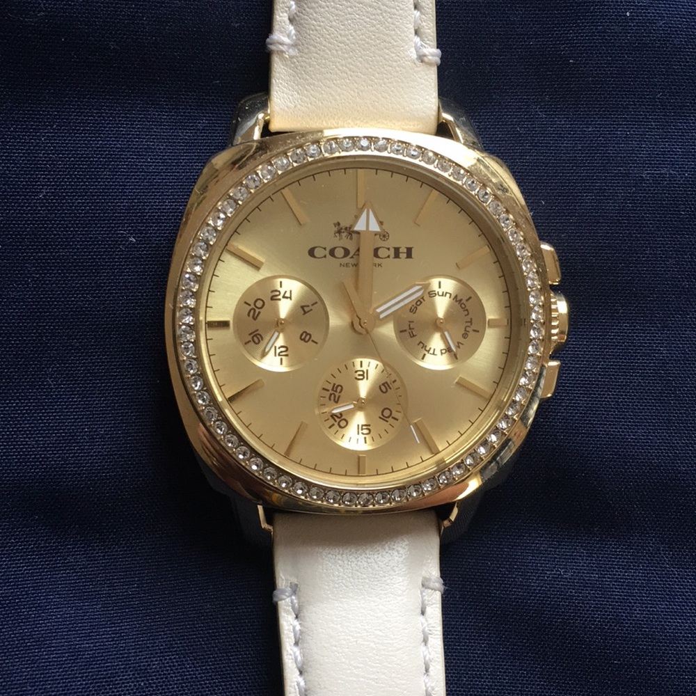 Timeless white and gold Coach watch